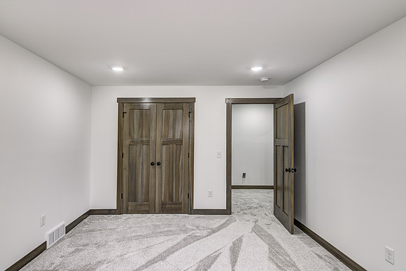 12 - Lower Level Bedroom - 1-2