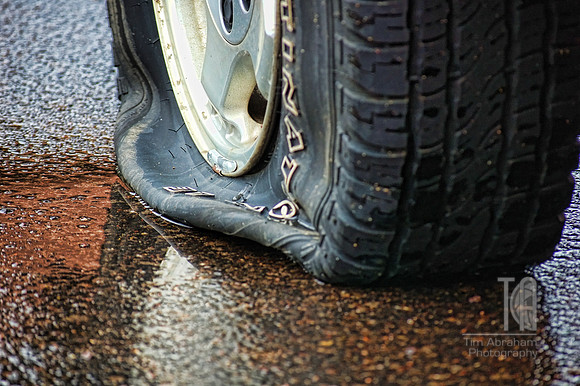 Day 51.  Well, that just sucks.  Another pothole claims a victim.