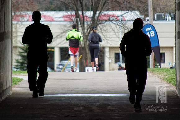 Day 54. Eau Claire marathon runners passing through the tunnel under Birch Street.