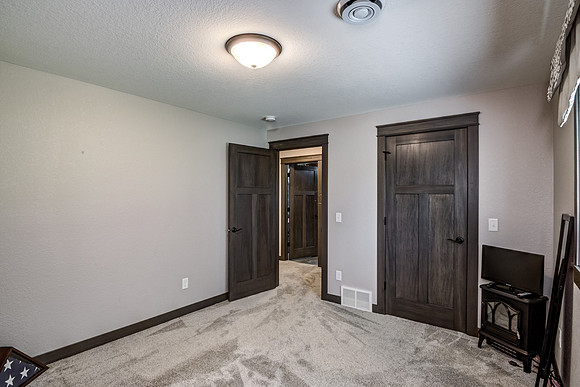 12 - Lower Level Bedroom - 1-2