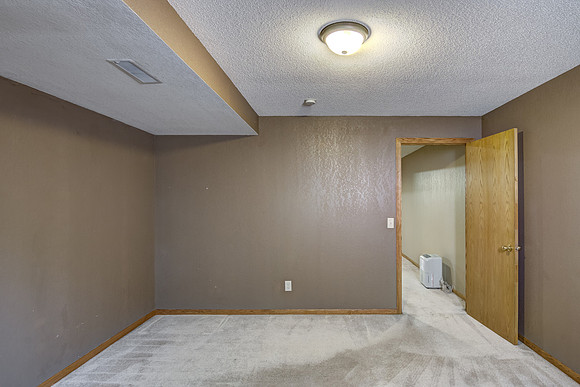 12 - Lower Level Bedroom - 1-2