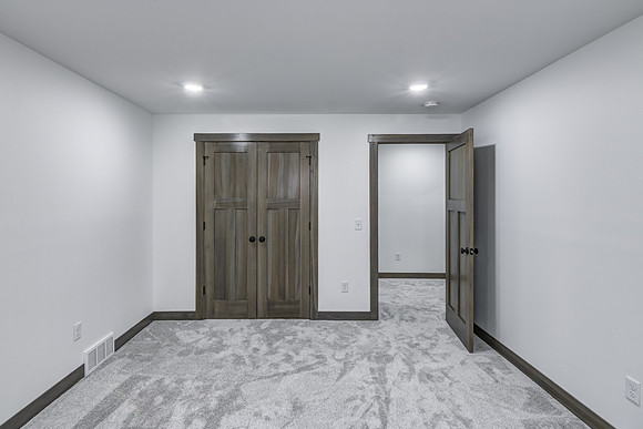 12 - Lower Level Bedroom - 1-2