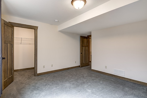 12 - Lower Level Bedroom - 1-2