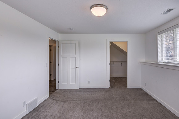 12 - Lower Level Bedroom - 1-2