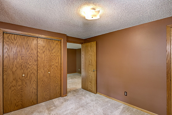 12 - Lower Level Bedroom - 1-2